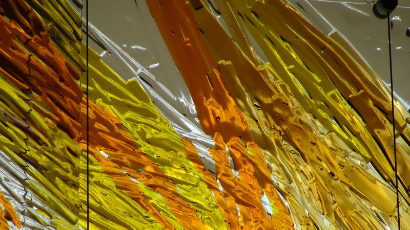 Resurrection. Suspended kilnformed glass mural for the chapel of Father Michael Goetz Secondary School, Mississauga, Ontario