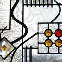 stained and leaded glass windows with crystal jewels and beveled glass