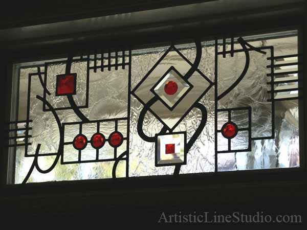 Stained and leaded glass transom window for the front enrance door