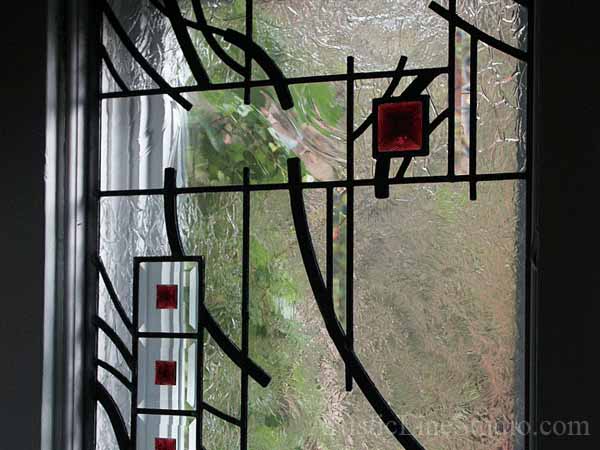 Stained and leaded glass foyer windows with jewels and bevelled glass
