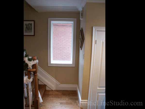Stained and leaded glass suspended panel for a stairecase window to block unpleasant view  adding privacy and beauty