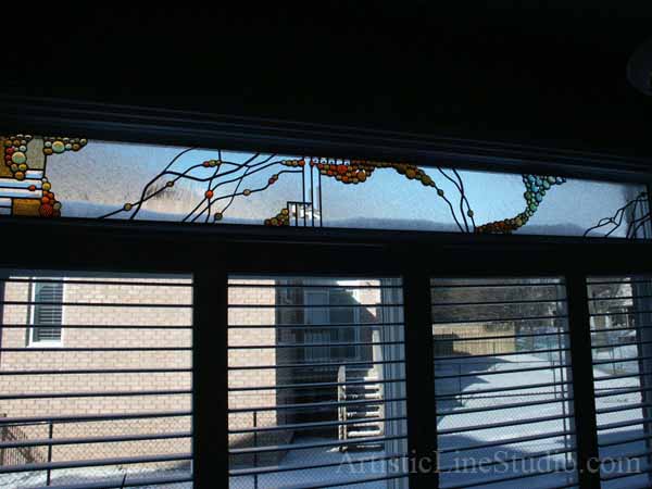 Stained and leaded glass window panel for a family room with fireplace to block unpleasant view  adding privacy and beauty