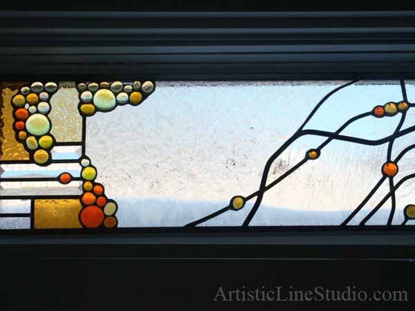 Stained and leaded glass window panel for a family room with fireplace to block unpleasant view  adding privacy and beauty
