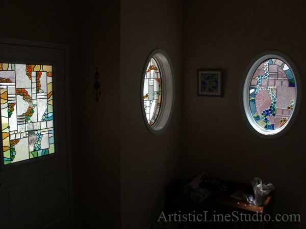 Stained and leaded glass oval foyer windows and enrance door lights with nuggets and bevelled glass