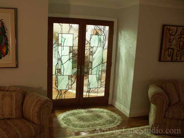 Stained and leaded glass interior door lights with fused glass elements