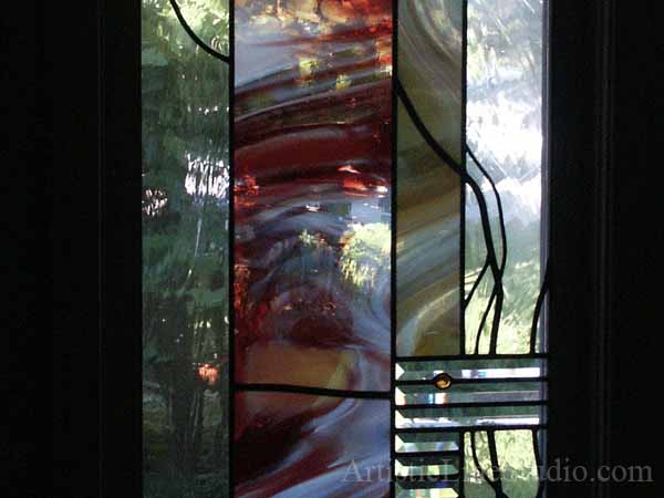 Stained and leaded glass foyer windows with mouthblown glass