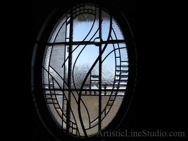 Stained and leaded glass bathroom window with jewels and beveled glass