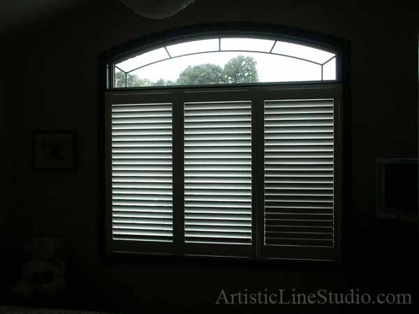 Stained and leaded glass bedroom window with jewels and beveled glass adding prinacy and beauty