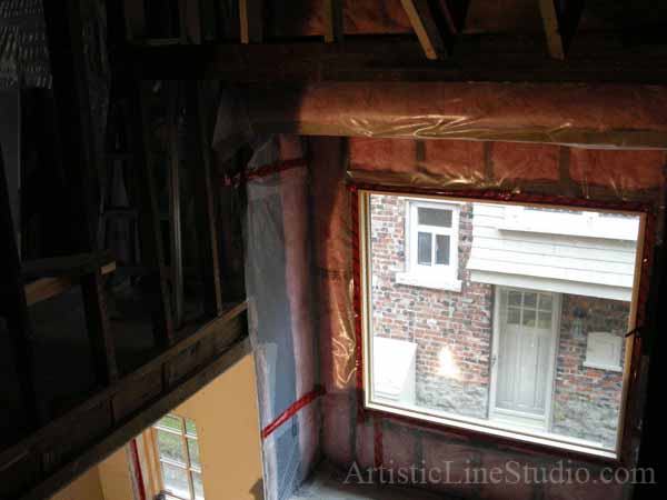 Stained and leaded glass for stair landing window adding privacy and beauty