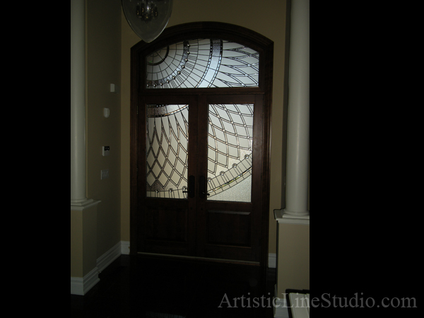 Stained and leaded glass front door entrance with jewels and beveled glass adding privacy and beauty