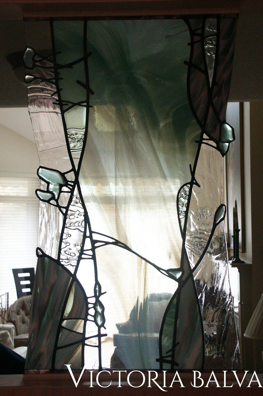 Contemporary stained and leaded glass free shape wall divider with kiln formed glass elements