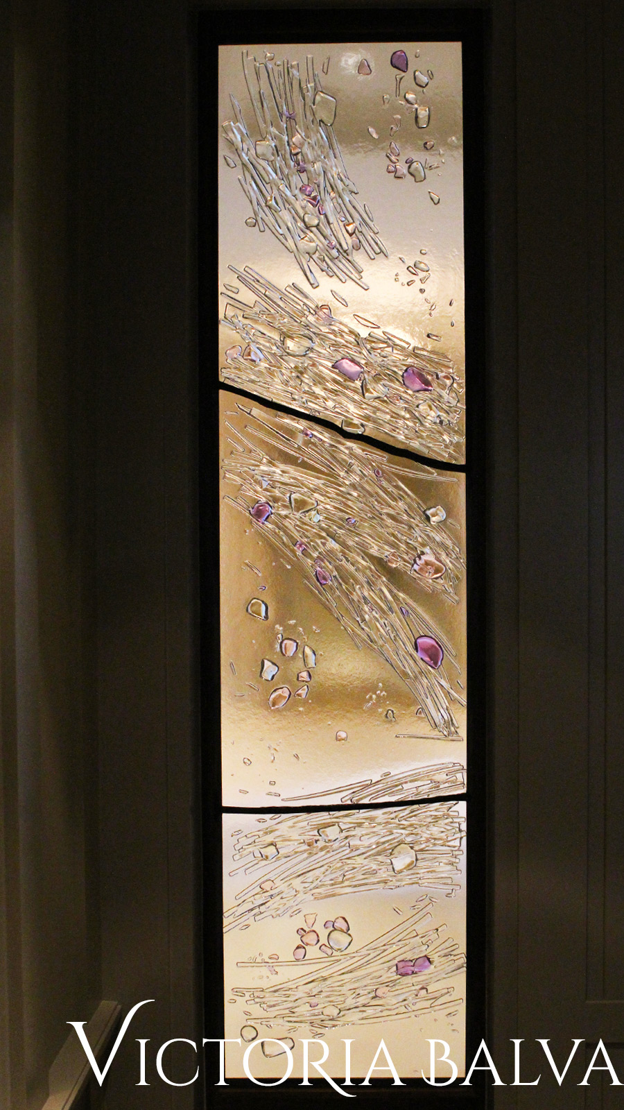 Detail of a kiln formed glass wall panel