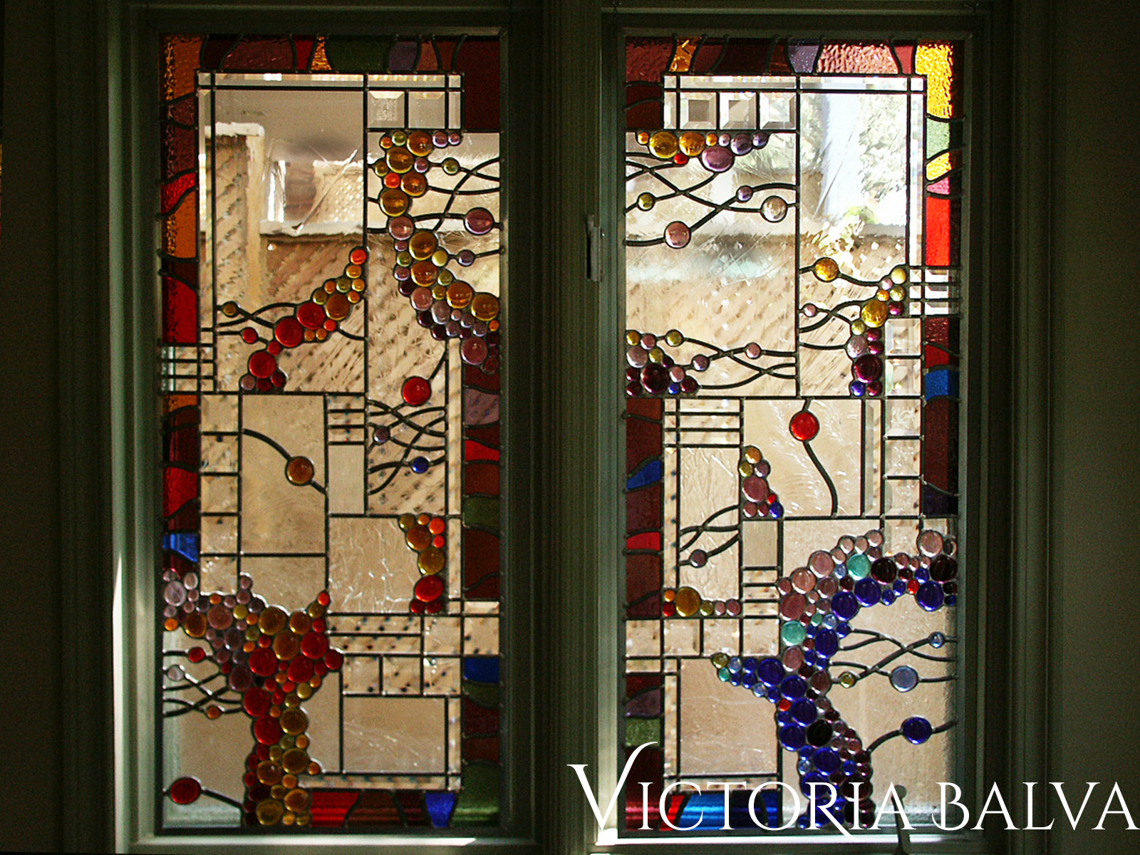Contemporary abstract stained, beveled leaded glass suspended panel with red nuggets and antique mouth blown glass