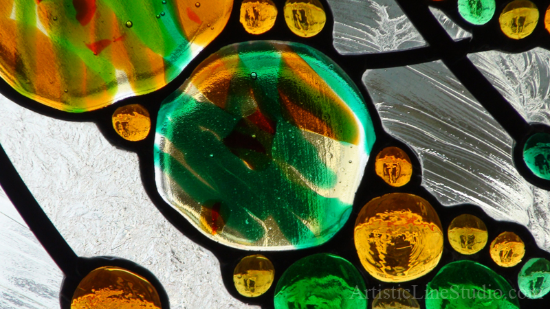 Modern minimalistic stained and leaded glass oval window