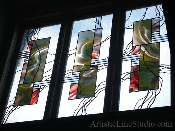 Stained leaded glass foyer windows with antique mouth blown glass in minimalism style