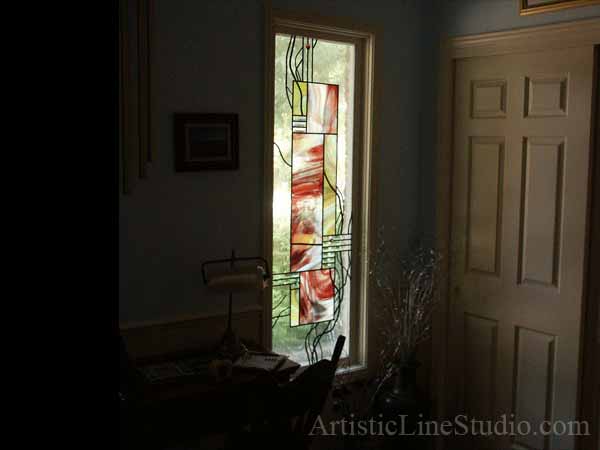 Stained, beveled leaded glass foyer windows with mouthblown glass after installation
