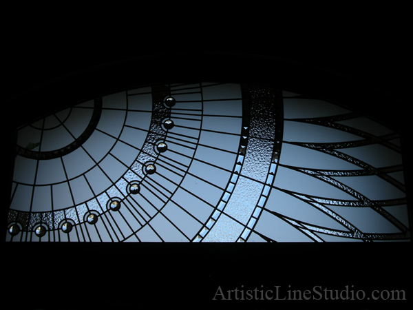 Stained and leaded transom window from inside