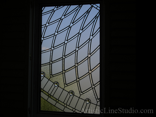 Decorative glass bathroom window with jewels and beveled glass