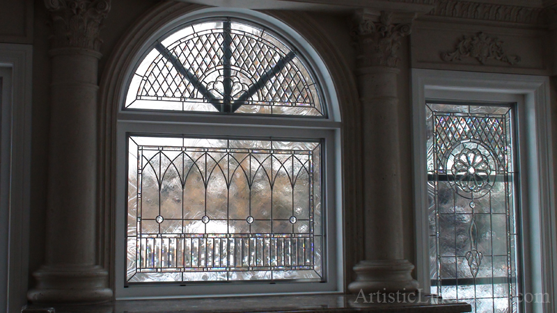  Classic leaded glass with clear beveled glass and jewels in a transom window