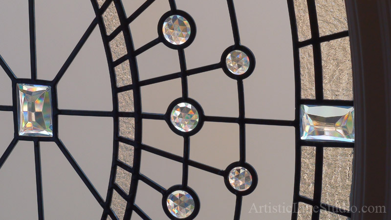  Traditional leaded glass oval window in a daytime