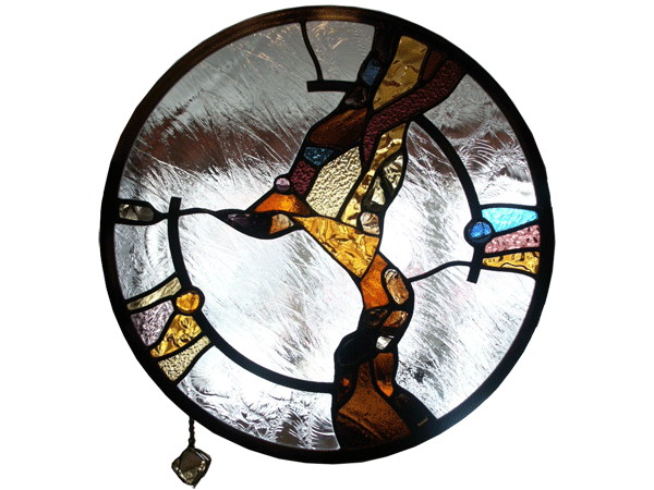 Stained and leaded glass round hanging panel with slab amber glass