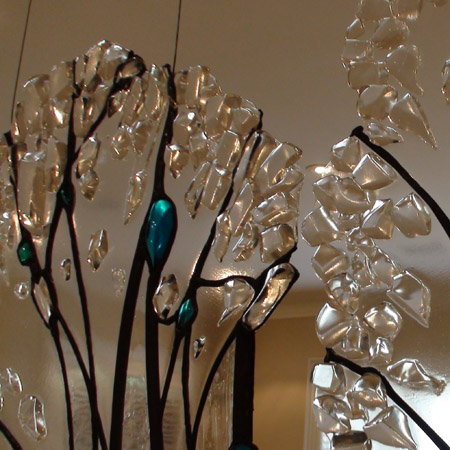 Free shape glass sculpture with kiln formed glass elements